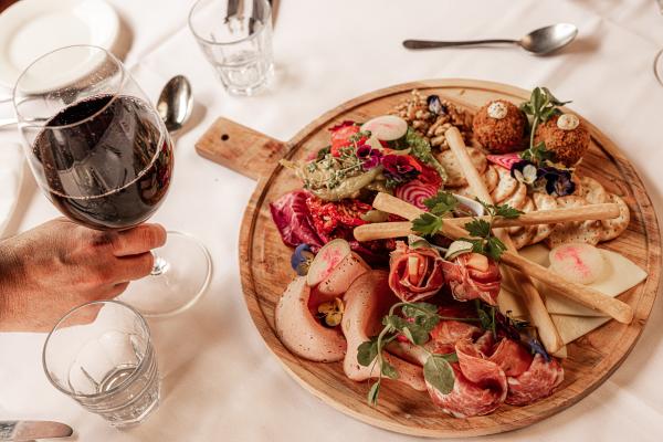 Selection of Australian & imported cured meats, home-made marinated vegetables, Citrus Table Kangaroo Valley Olives I Arancini I Cheese